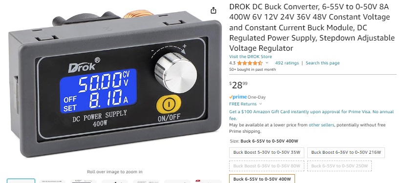 A black device with a blue screen and a blue display

Description automatically generated